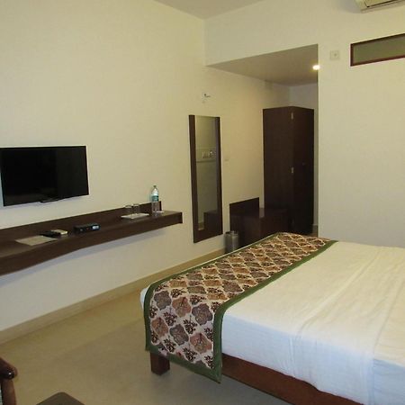 Palguni Residency Otel Hassan Dış mekan fotoğraf