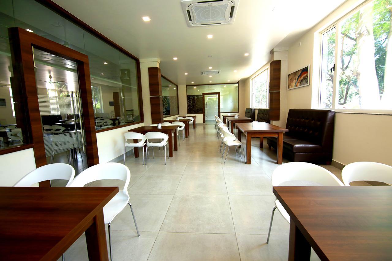 Palguni Residency Otel Hassan Dış mekan fotoğraf